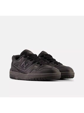 New Balance 550 Triple Black sneakers featuring an all-black boys size 6.5